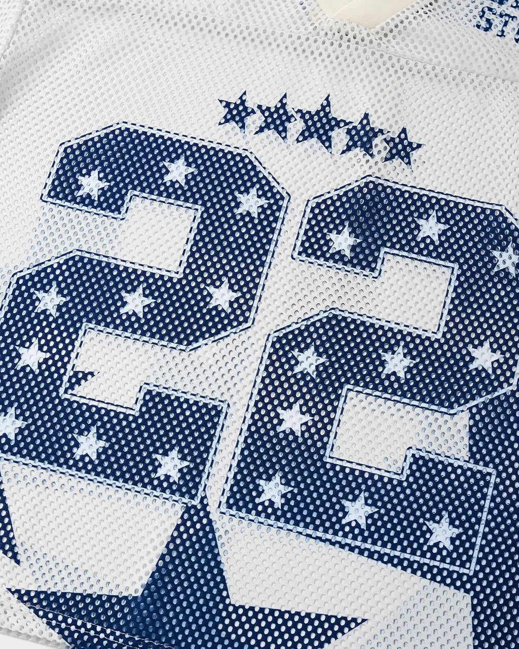 Black oversized mesh jersey with a white star graphic on the front, featuring a relaxed fit and streetwear style by INFLATION.