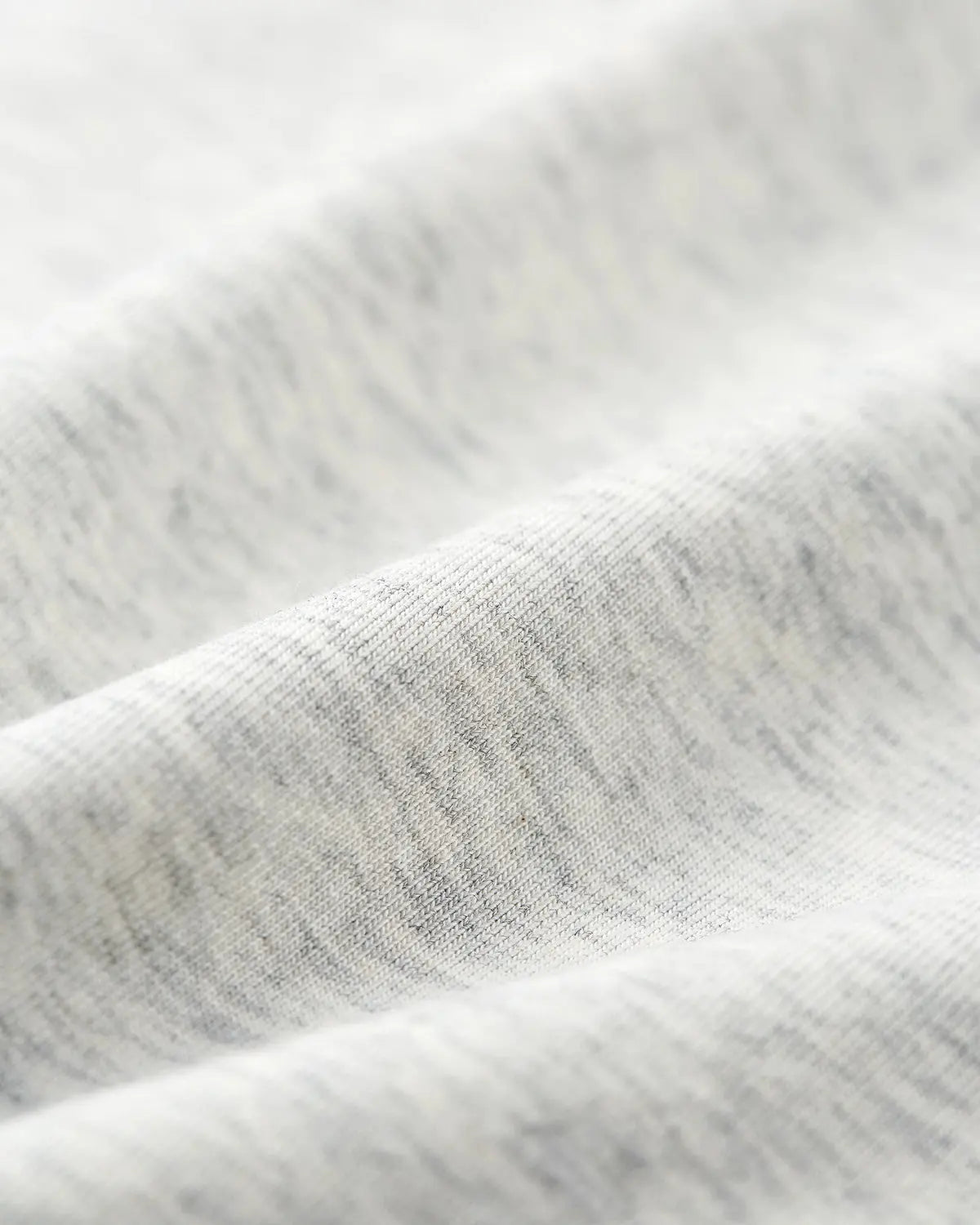 Deconstructed oversized T-shirt by INFLATION Streetwear featuring a loose fit and unique design details.