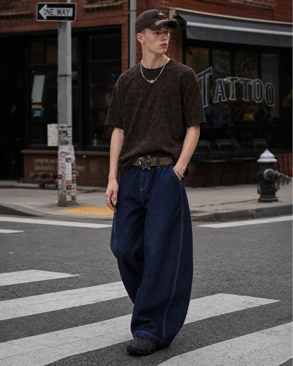Raw washed barrel jeans by INFLATION, stylish streetwear pants featuring a relaxed fit and distressed denim detail.