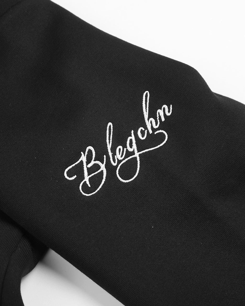 Inflation Streetwear braided embroidery boxy zip-up hoodie with front zipper and embroidered details, casual streetwear style.