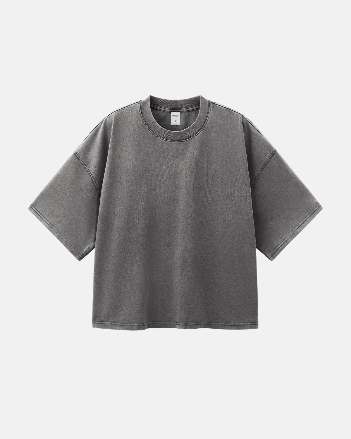 Distressed boxy washed T-shirt by INFLATION Streetwear, featuring a relaxed fit and faded, vintage-inspired design.