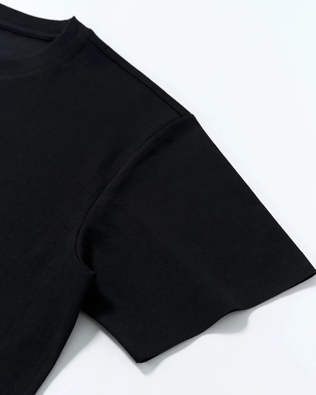 AirFlow Seam-Sealed Cooling Tee by INFLATION, featuring lightweight, breathable fabric and sleek streetwear style for active wear.