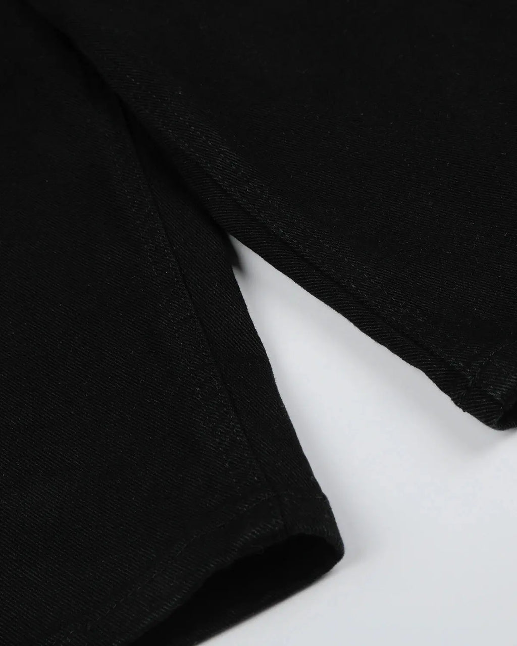 Inflation Streetwear back buckle longline casual shorts, black pants with back buckle detail, relaxed fit and stylish design.