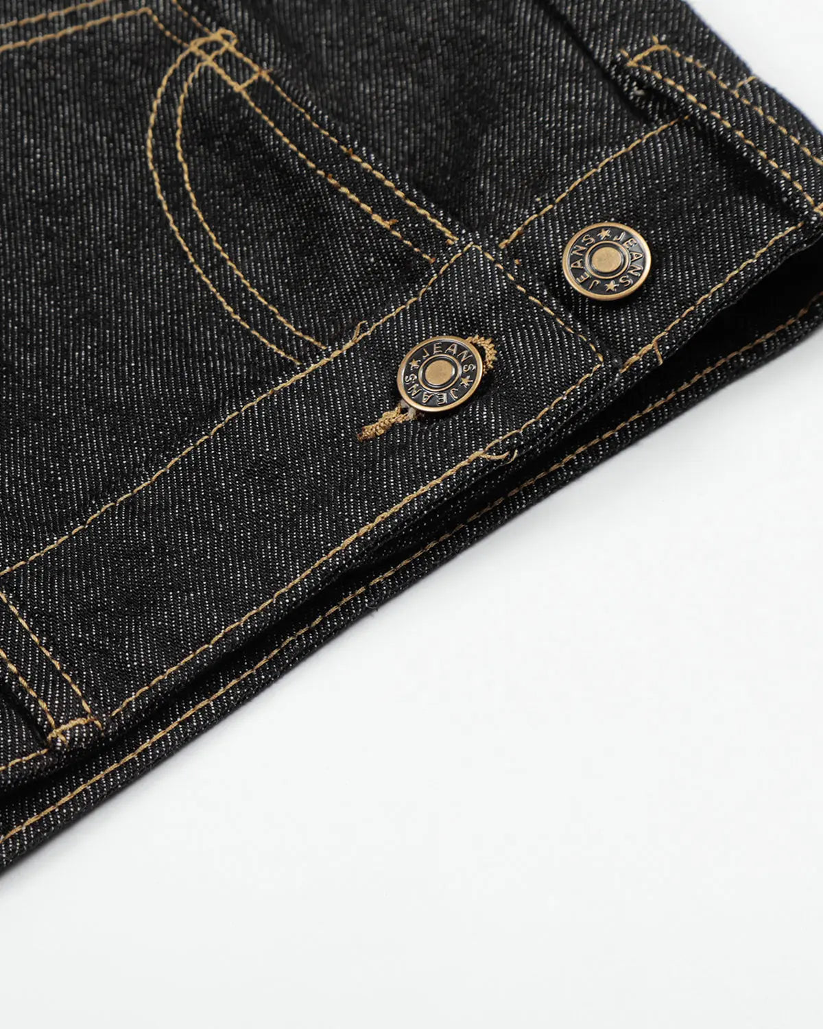 Deconstructed raw denim jorts by INFLATION, casual pants featuring distressed details and frayed hems, laid flat on a white background.