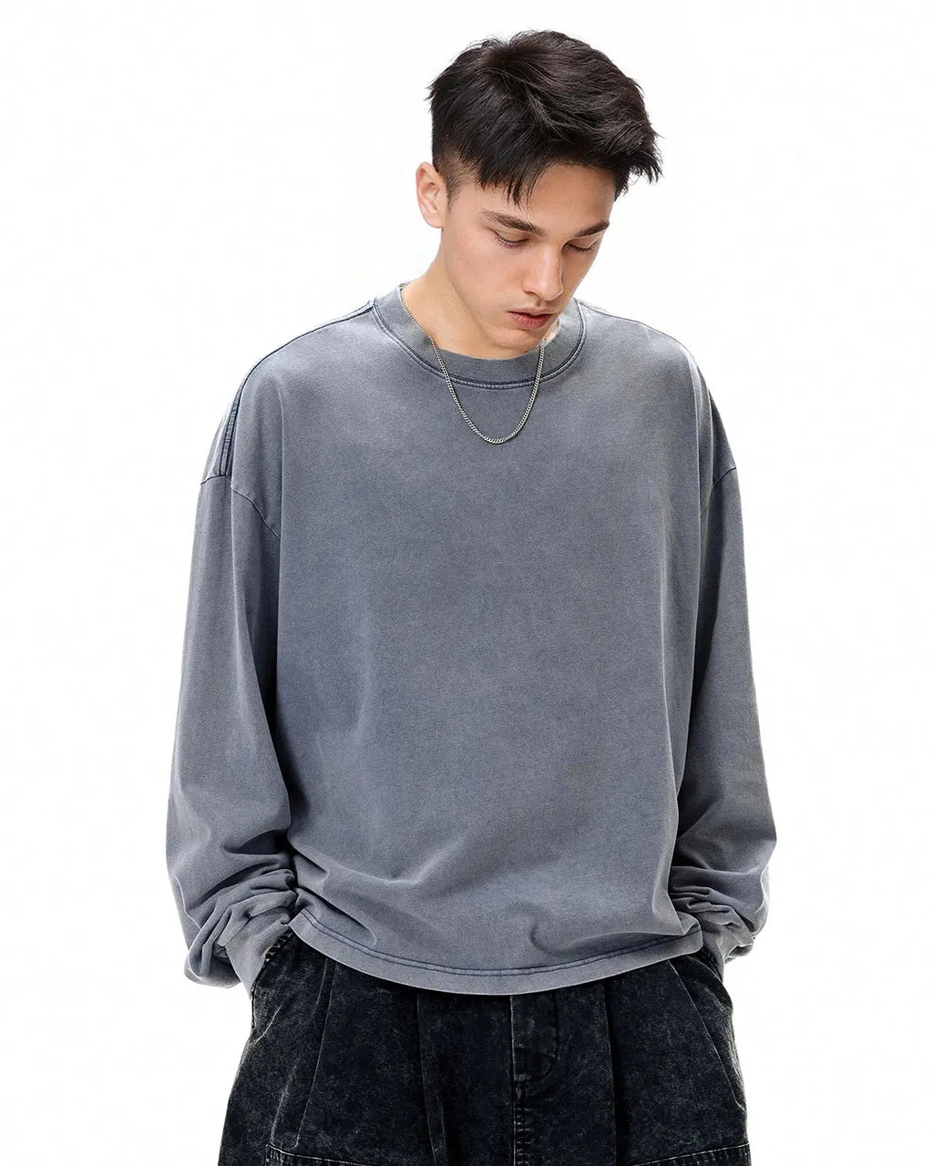 Distressed washed long sleeve tee by INFLATION Streetwear featuring a relaxed fit and vintage-inspired design.