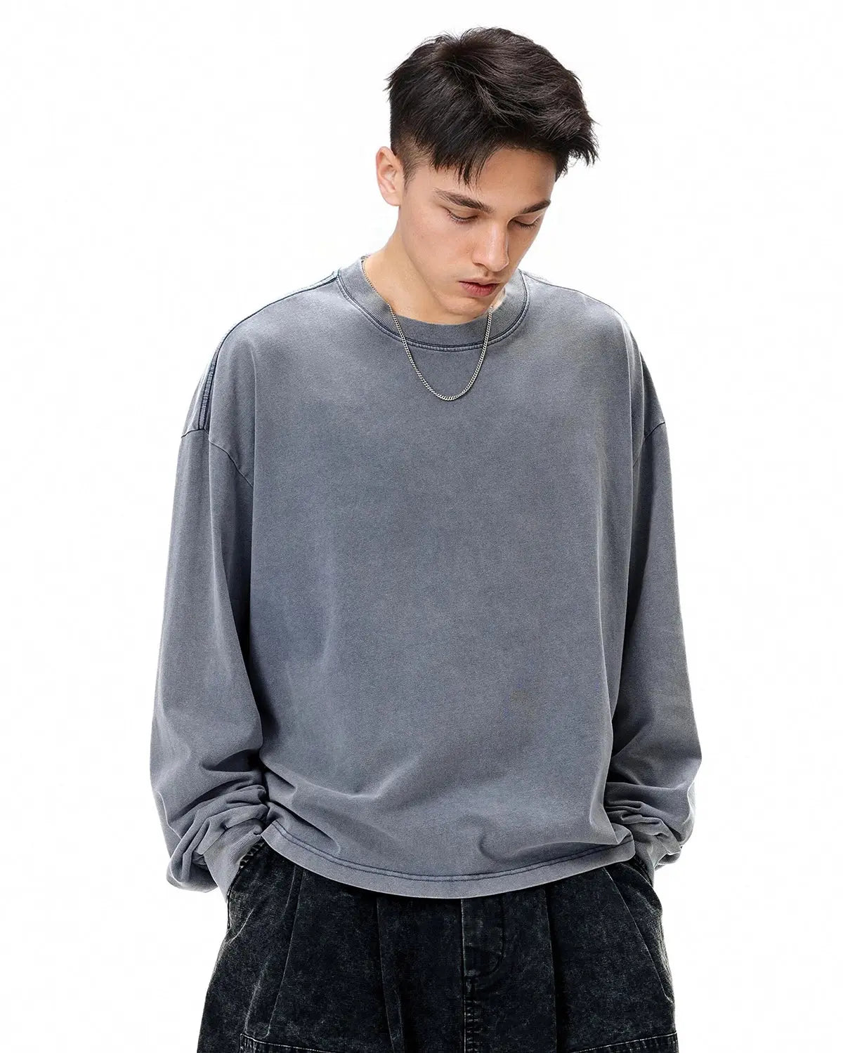 Distressed washed long sleeve tee by INFLATION Streetwear featuring a relaxed fit and vintage-inspired design.
