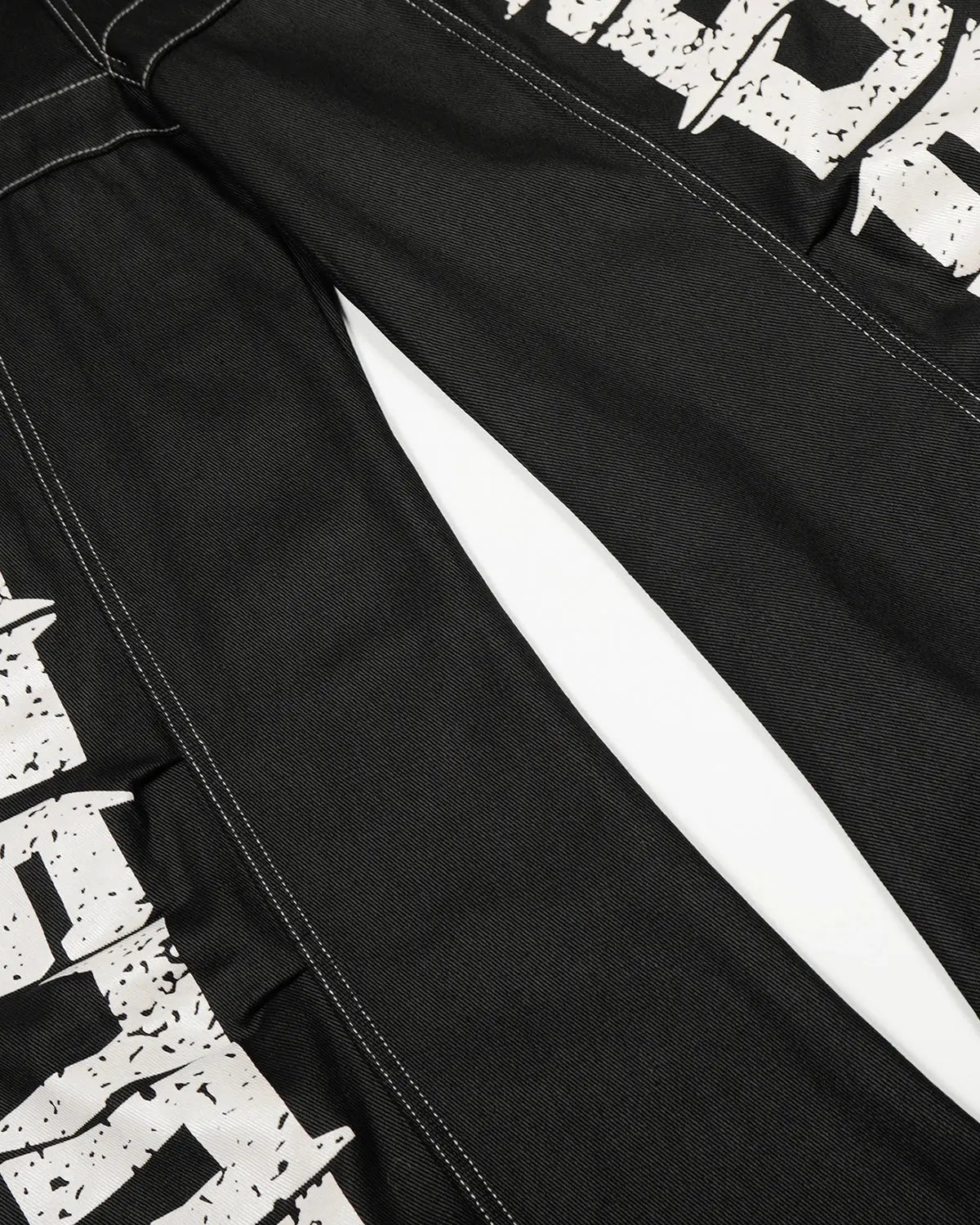 Dark denim Letter Graphic Cargo Barrel Jeans by INFLATION streetwear with bold letter patches and relaxed fit.