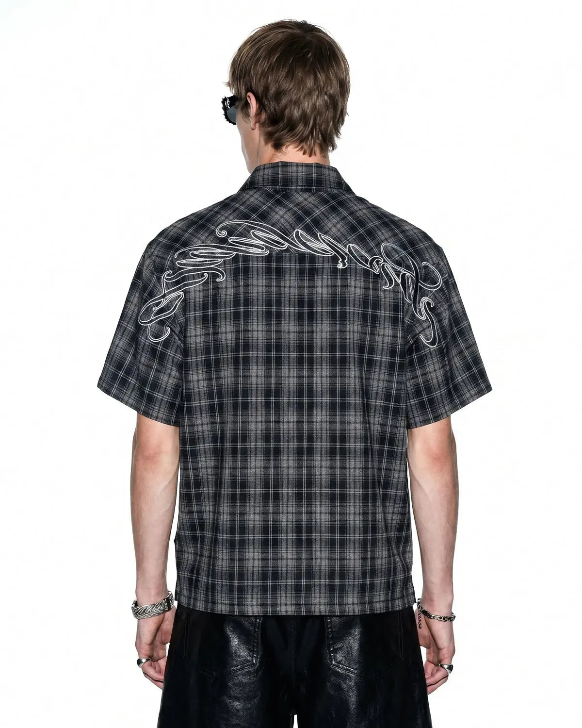 Embroidered plaid script shirt by INFLATION Streetwear, featuring a casual button-up design with embroidered details.