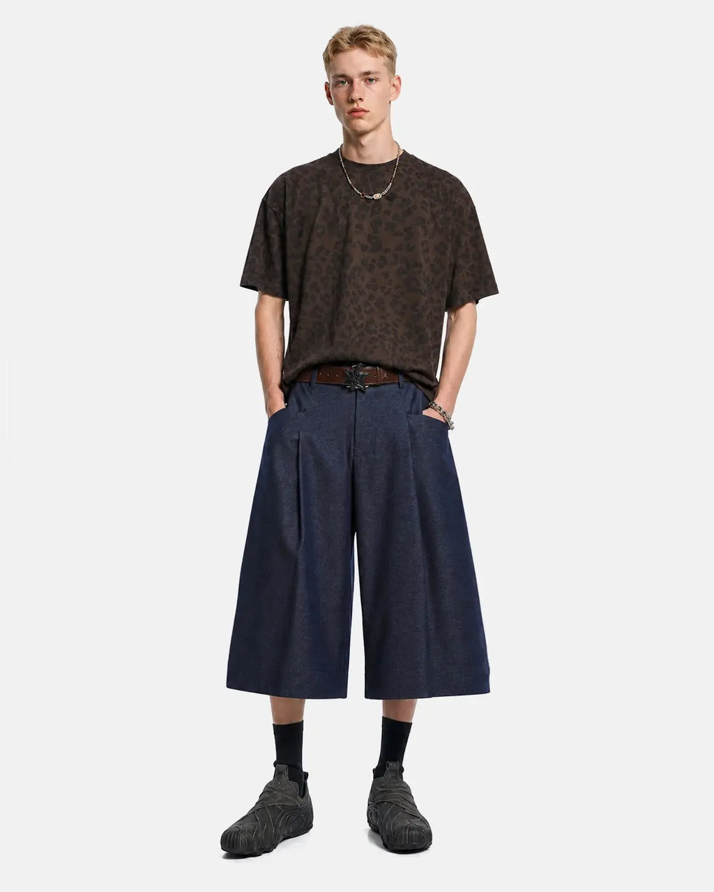 Inflation Streetwear pleated wide-leg tailored shorts in beige fabric, high-waisted with a relaxed fit and front pleats.