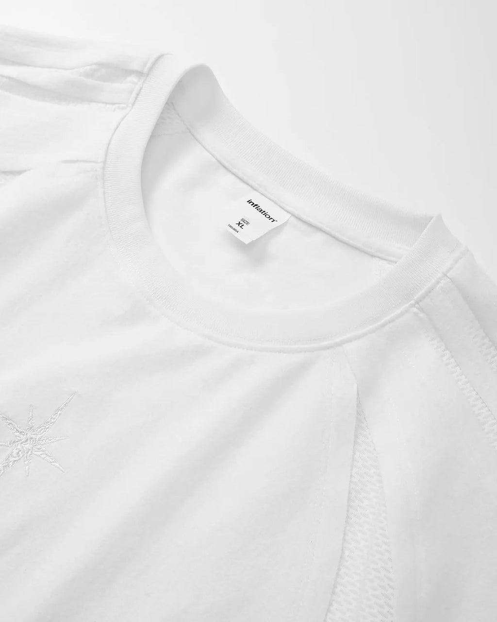 Inflation Streetwear mesh patchwork embroidered T-shirt with colorful stitching and detailed embroidery, casual street style top.