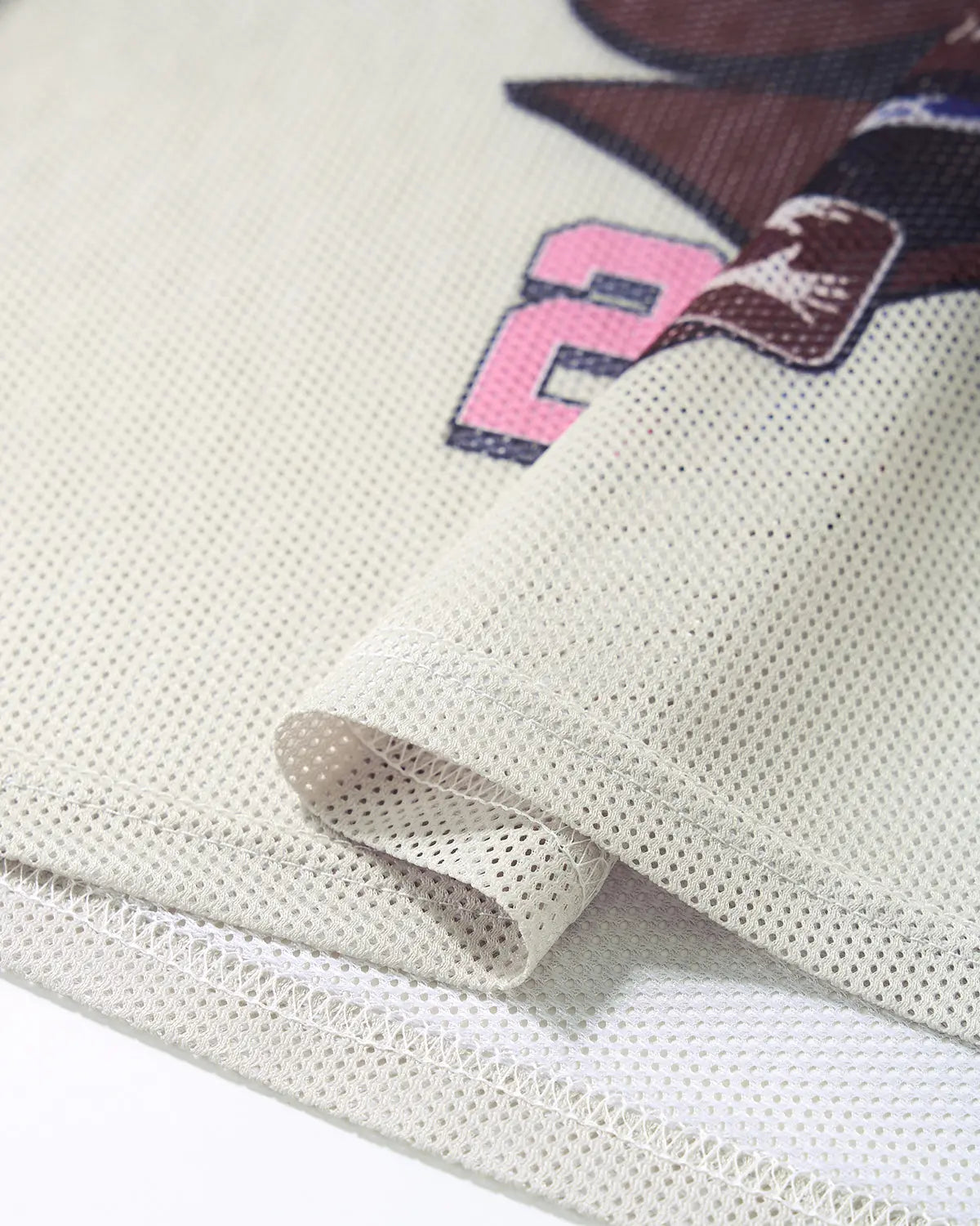 Retro Graphic Mesh Jersey T-shirt by INFLATION featuring vibrant streetwear-inspired design and breathable mesh fabric.