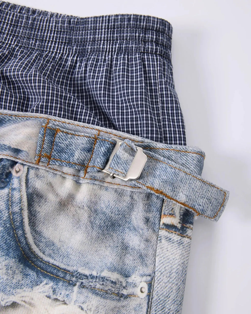Layered digital print baggy jeans from INFLATION Streetwear with a relaxed fit and bold, colorful design on a casual model.