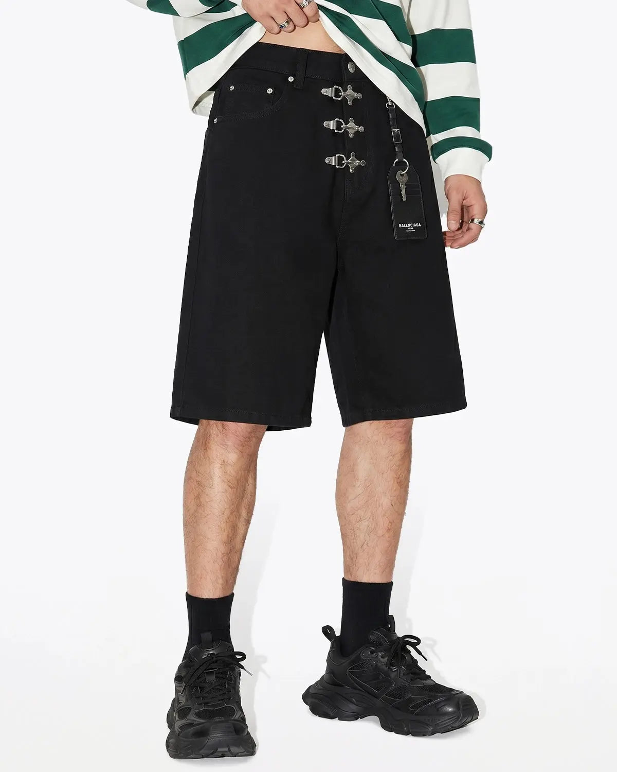 Metal clasp baggy jorts from INFLATION streetwear featuring distressed denim and relaxed fit with metal hardware details.