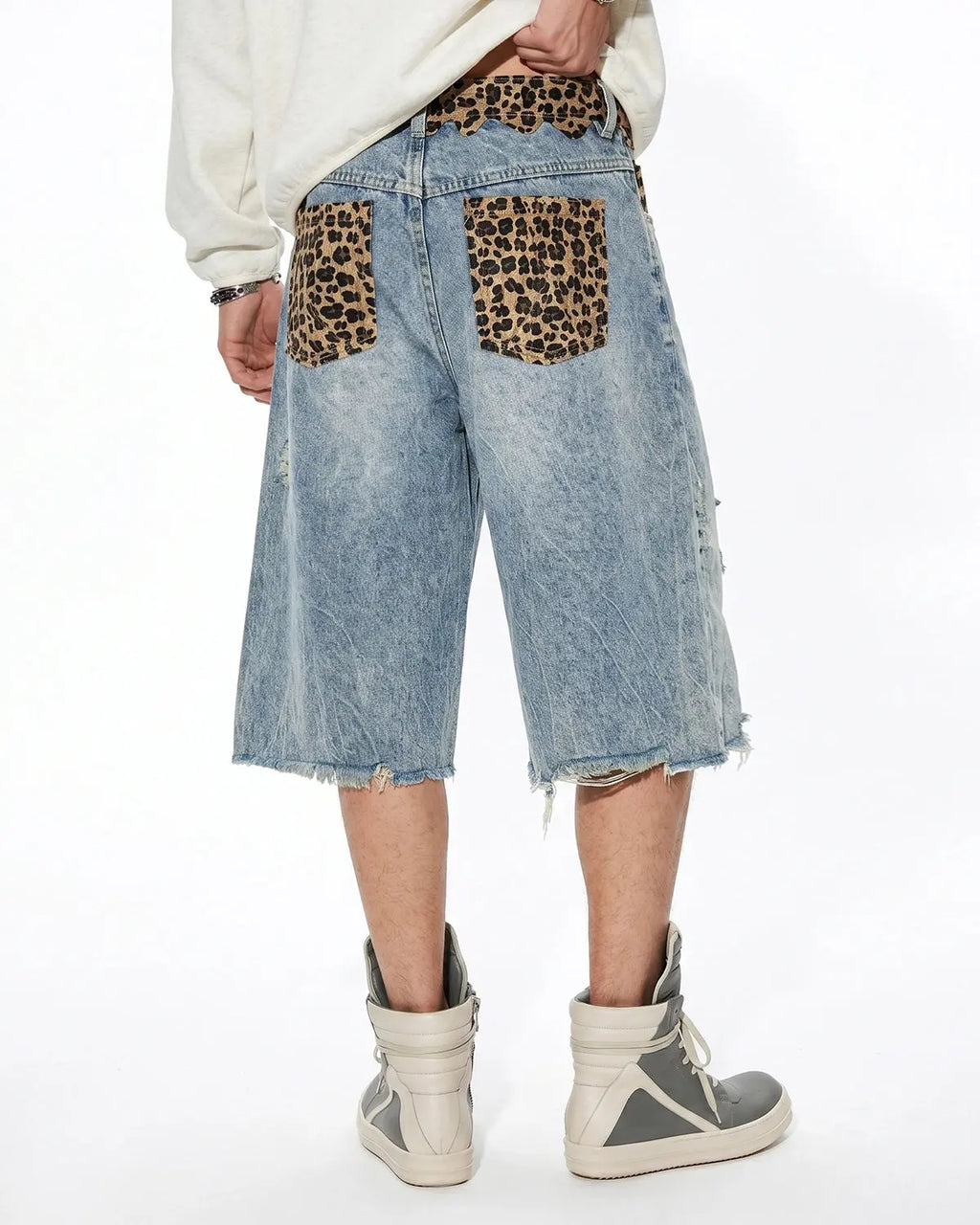 Leopard patchwork jorts by INFLATION, denim shorts with leopard print and patchwork design, casual streetwear pants.