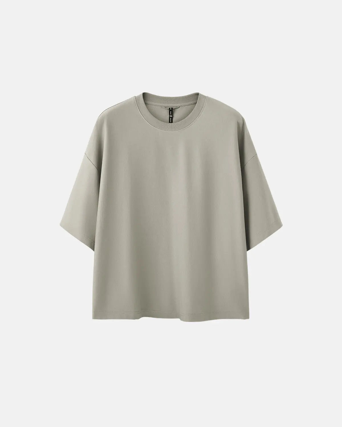 Blank oversized boxy T-shirt by INFLATION, featuring a loose fit and minimalist design on plain fabric.