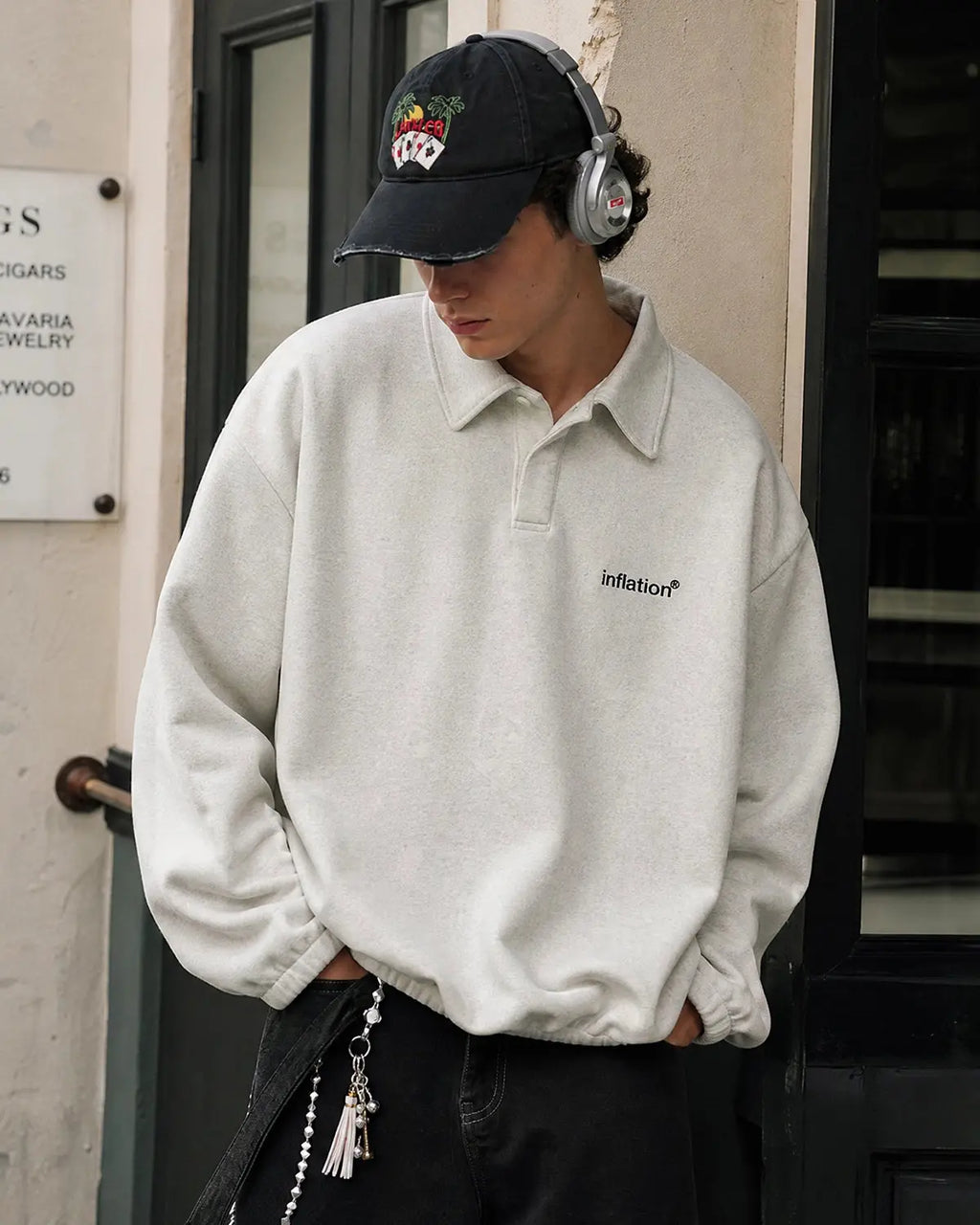 Inflation Streetwear Brand Quarter Polo Sweatshirt in neutral color, featuring a classic collar and relaxed fit.