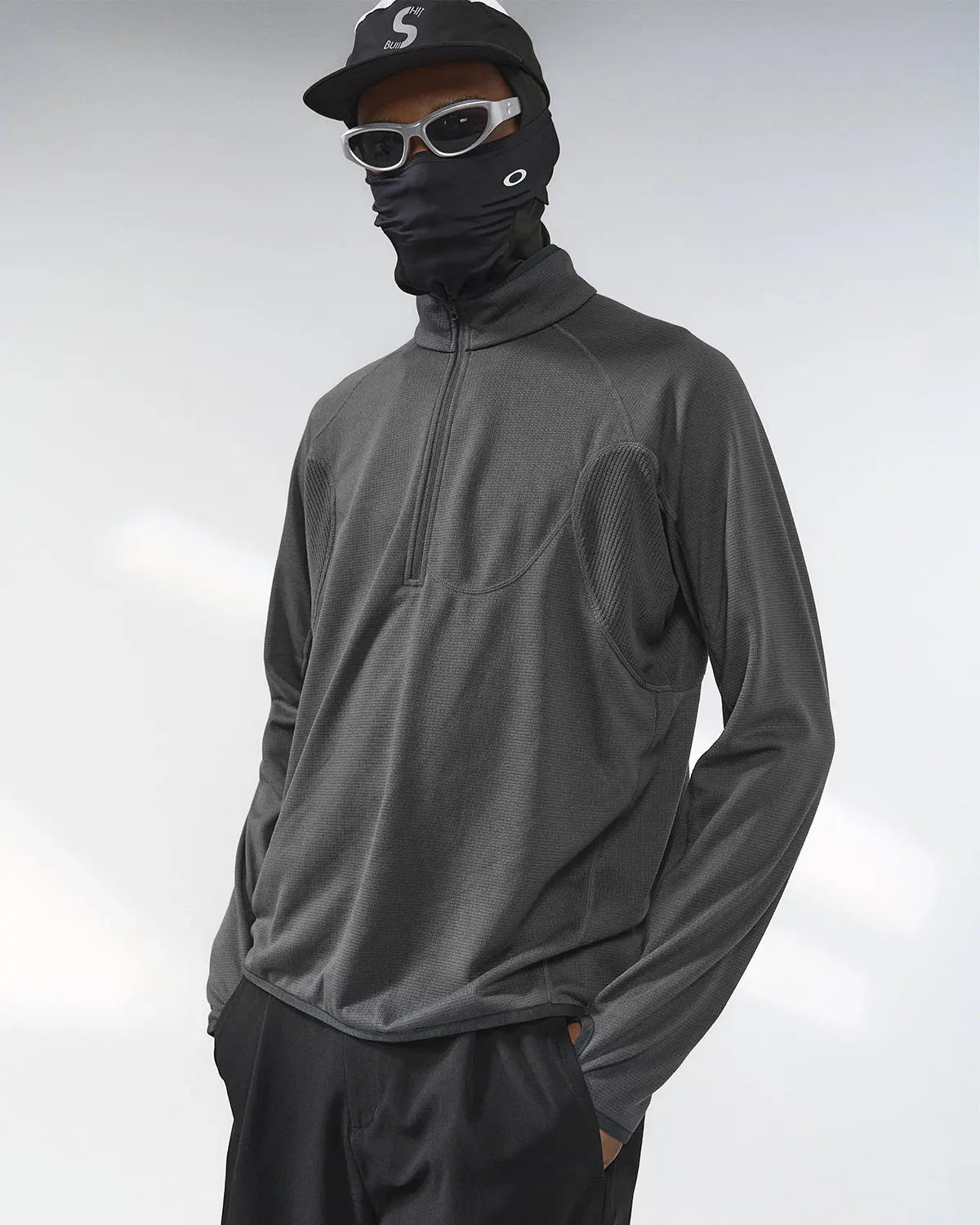 Inflation Streetwear breathable grid fleece half-zip sweatshirt, showcasing its textured fabric and stylish fit in a close-up view.