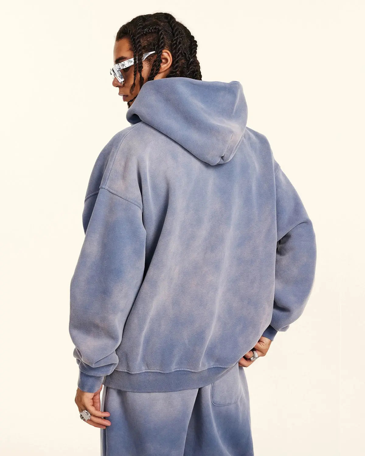 Acid washed zip-up hoodie from INFLATION Streetwear, featuring a casual fit and distressed, stylish design.