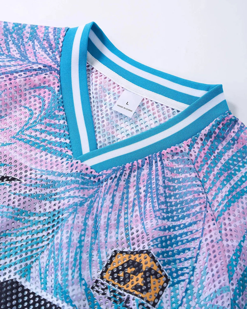 Oversized mesh football jersey by INFLATION featuring breathable fabric and bold athletic design.