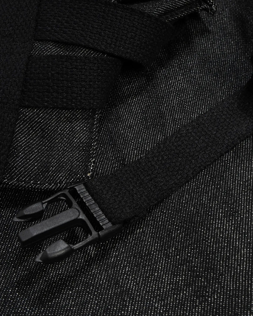Raw denim tactical cargo jorts by INFLATION, rugged streetwear pants with multiple pockets and distressed denim finish.