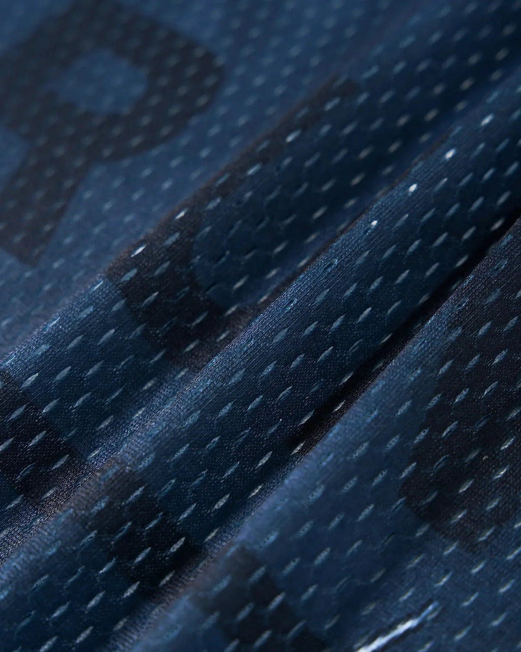 Digital printing mesh jersey t-shirt by INFLATION, featuring lightweight, breathable mesh fabric with bold print design.