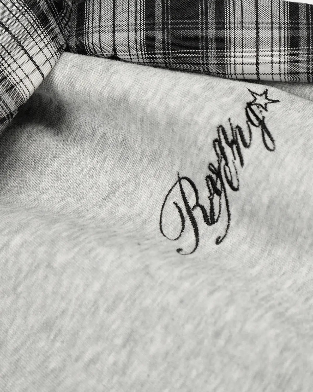 Plaid layered baggy sweatpants from INFLATION Streetwear featuring a relaxed fit and stylish plaid design.