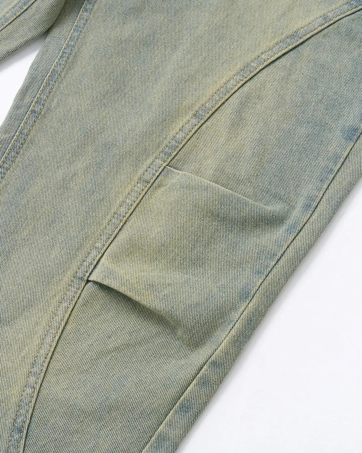 Vintage Washed Baggy Jeans by INFLATION, showcasing relaxed fit and distressed denim style on a model.