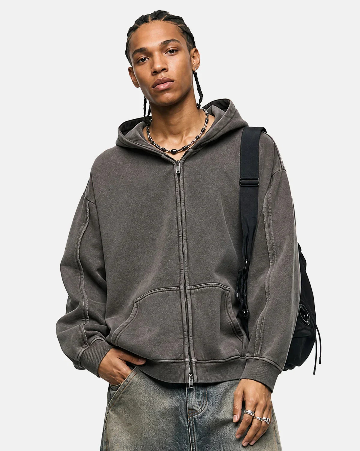 Washed raw edge boxy zip-up hoodie by INFLATION, featuring a relaxed fit and raw hem details, front zipper closure.