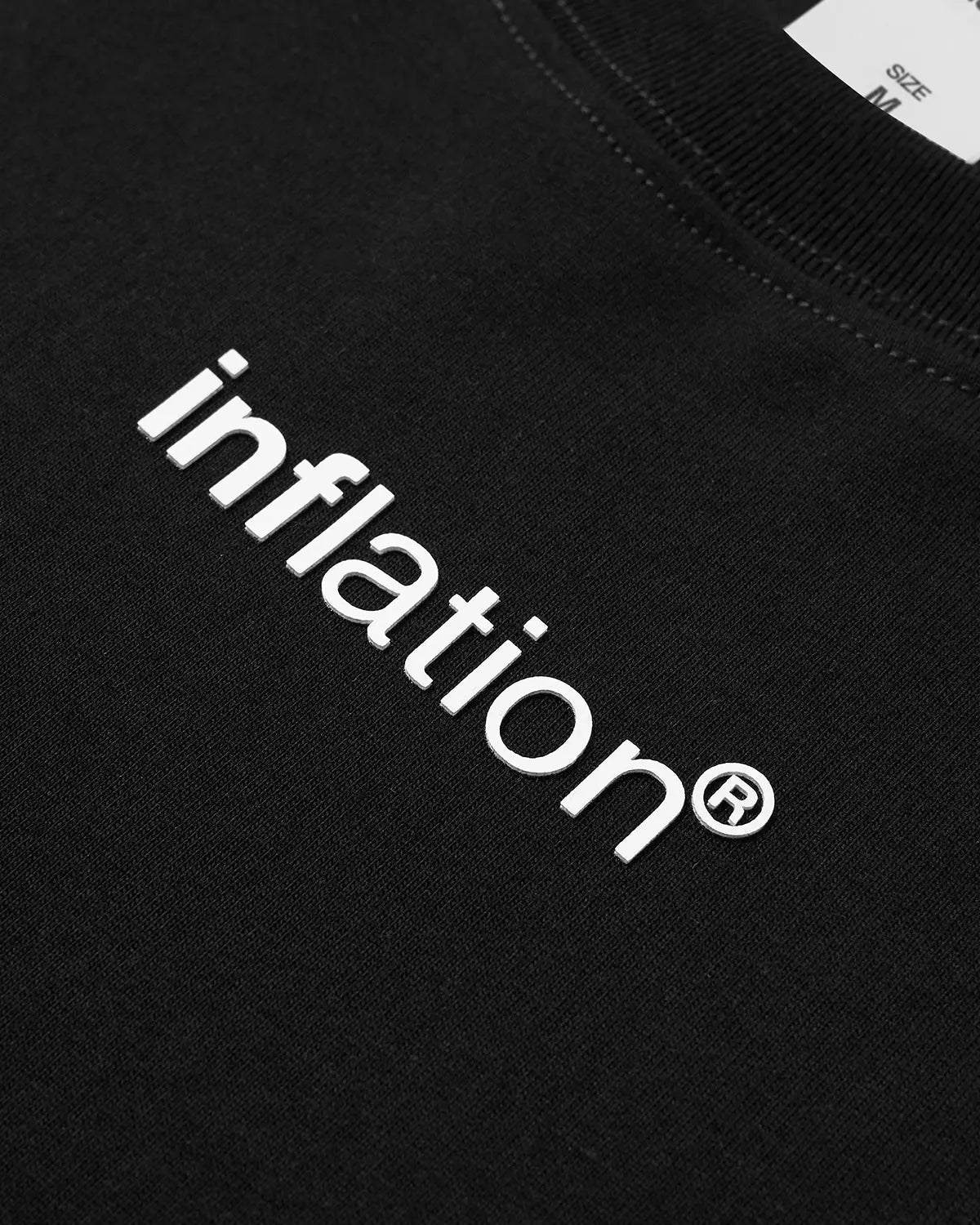 Inflation Streetwear boxy logo tee featuring a bold brand logo on the front, made from soft cotton fabric.