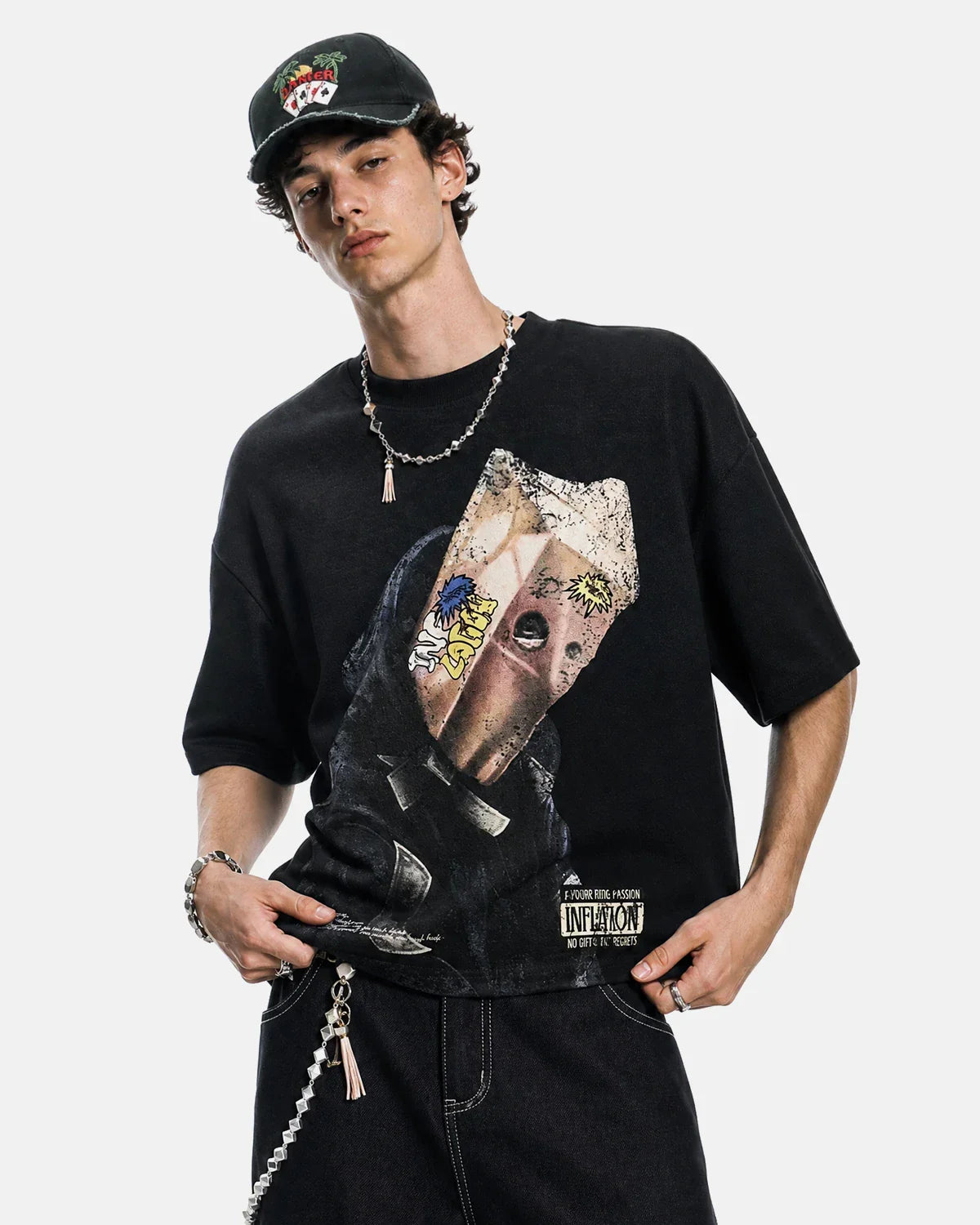 Washed boxy graphic T-shirt from INFLATION streetwear brand featuring bold printed design and relaxed fit.