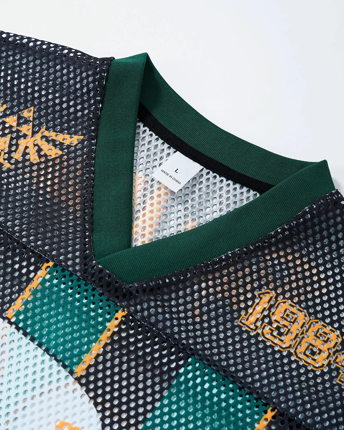 Vintage striped mesh jersey by INFLATION featuring colorful, breathable mesh fabric with bold stripe patterns, streetwear style.