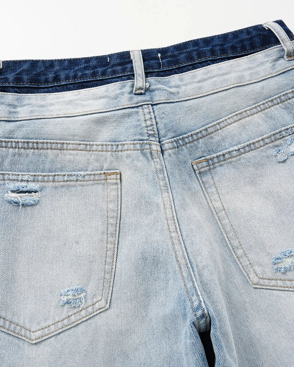 Inflation Double Waist Distressed Baggy Jeans with ripped details and relaxed fit, showcasing casual streetwear style.