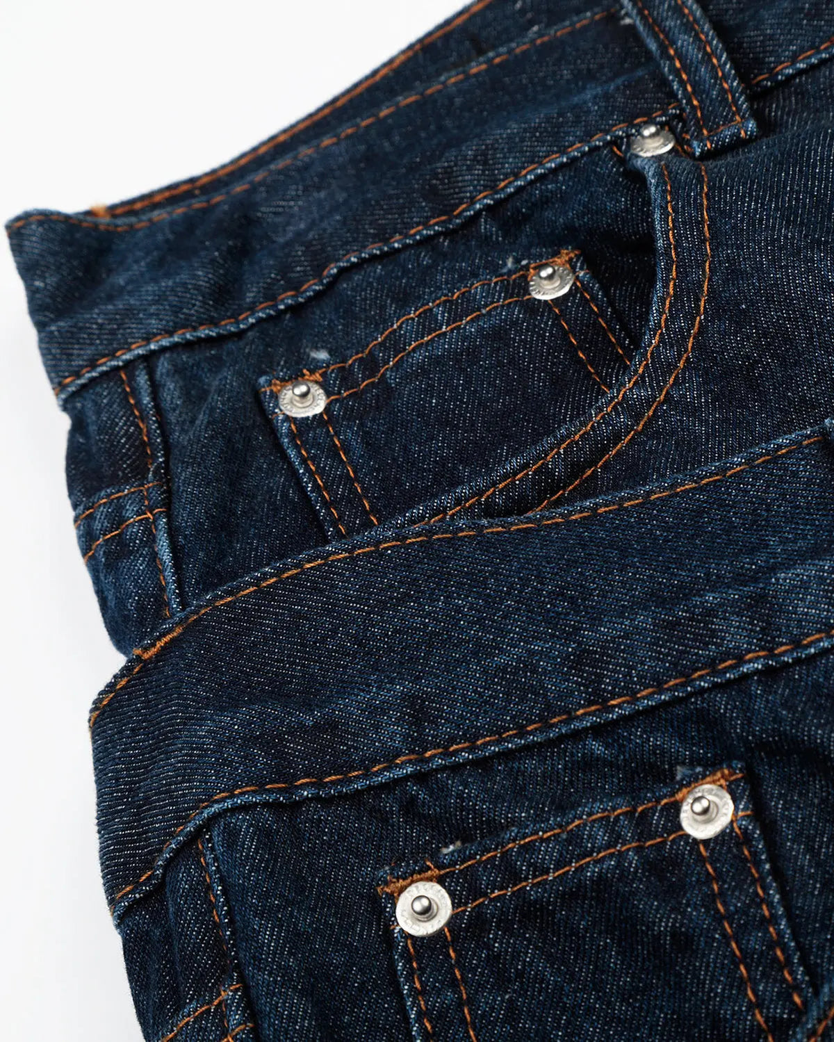 Inflation streetwear double waist studded denim long jorts, stylish men's pants with distressed details and metal stud accents.