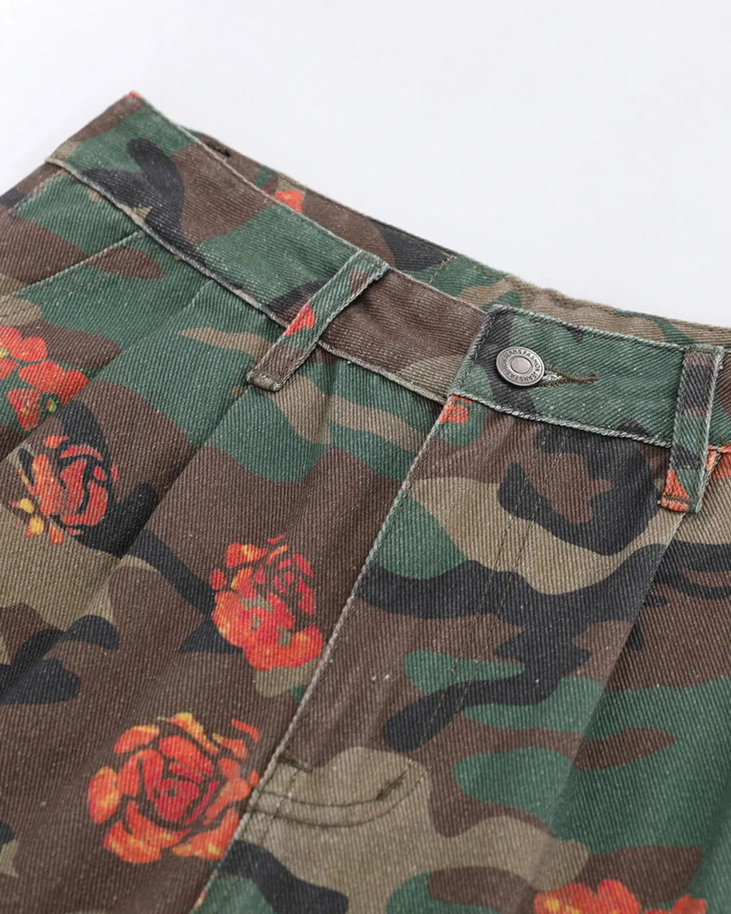 Inflation Floral Camo Cargo Longline Shorts featuring a vibrant camouflage pattern and multiple pockets for a streetwear look.