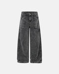 Deconstructed distressed barrel jeans by INFLATION featuring ripped fabric, faded denim, and unique streetwear style.