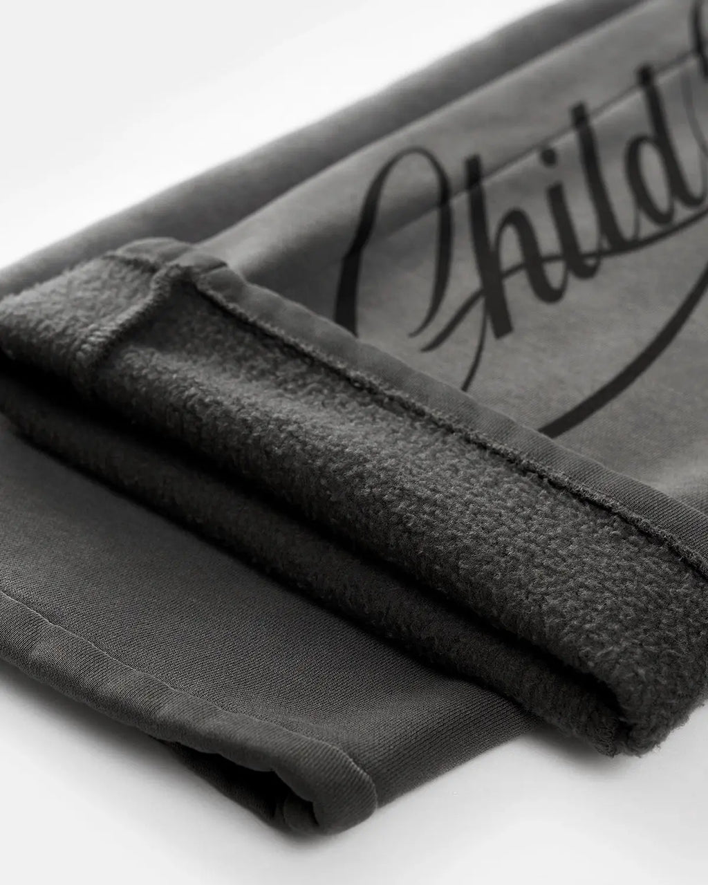 Acid washed INFLATION streetwear sweatpants with relaxed fit and elastic waistband, stylish and comfortable for casual wear.