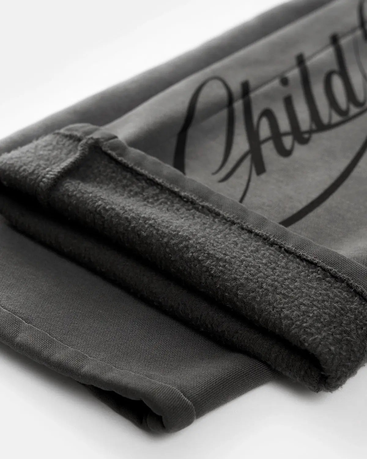 Acid washed INFLATION streetwear sweatpants with relaxed fit and elastic waistband, stylish and comfortable for casual wear.