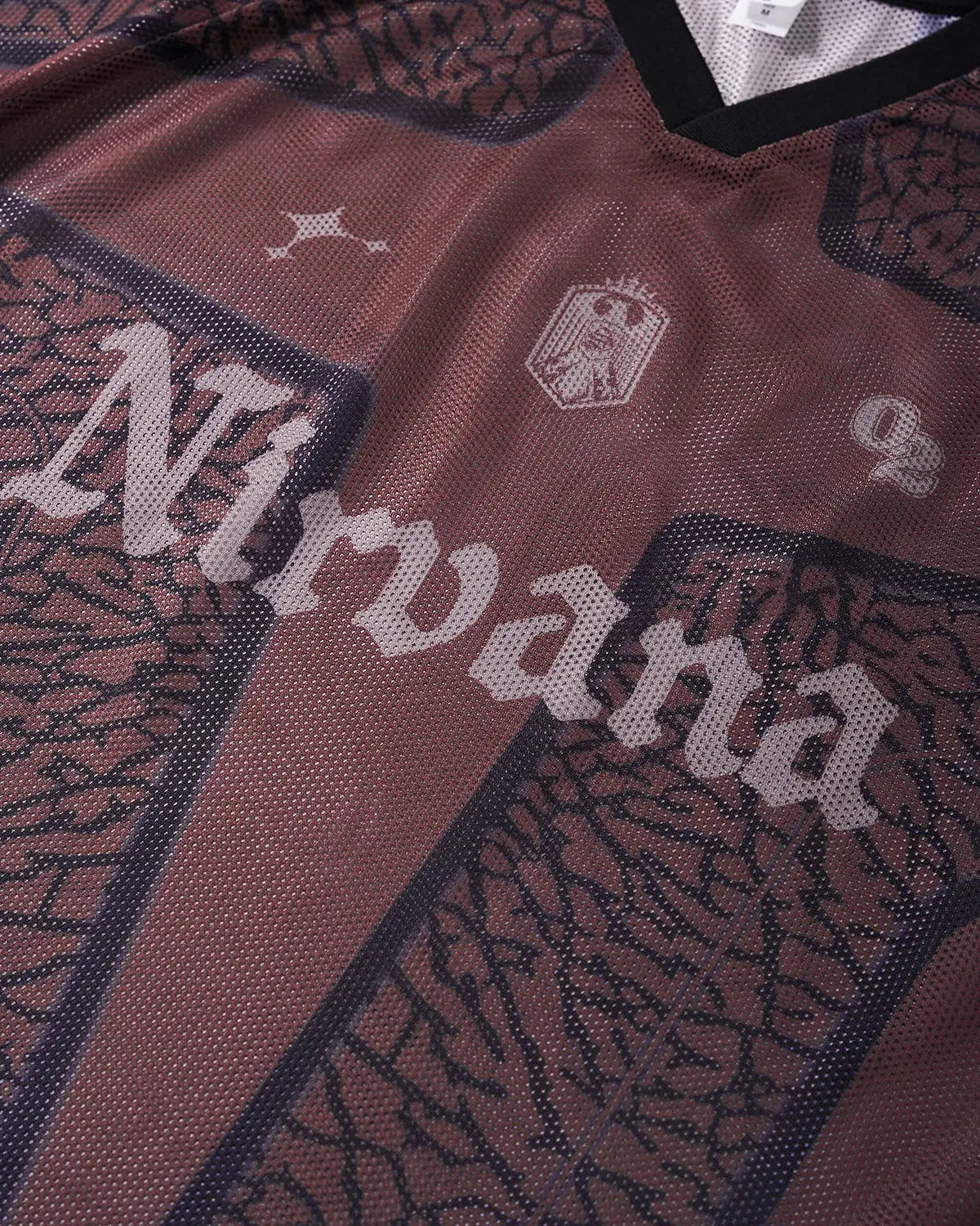 Inflation Streetwear tribal pattern mesh jersey T-shirt featuring bold tribal designs and breathable mesh fabric.