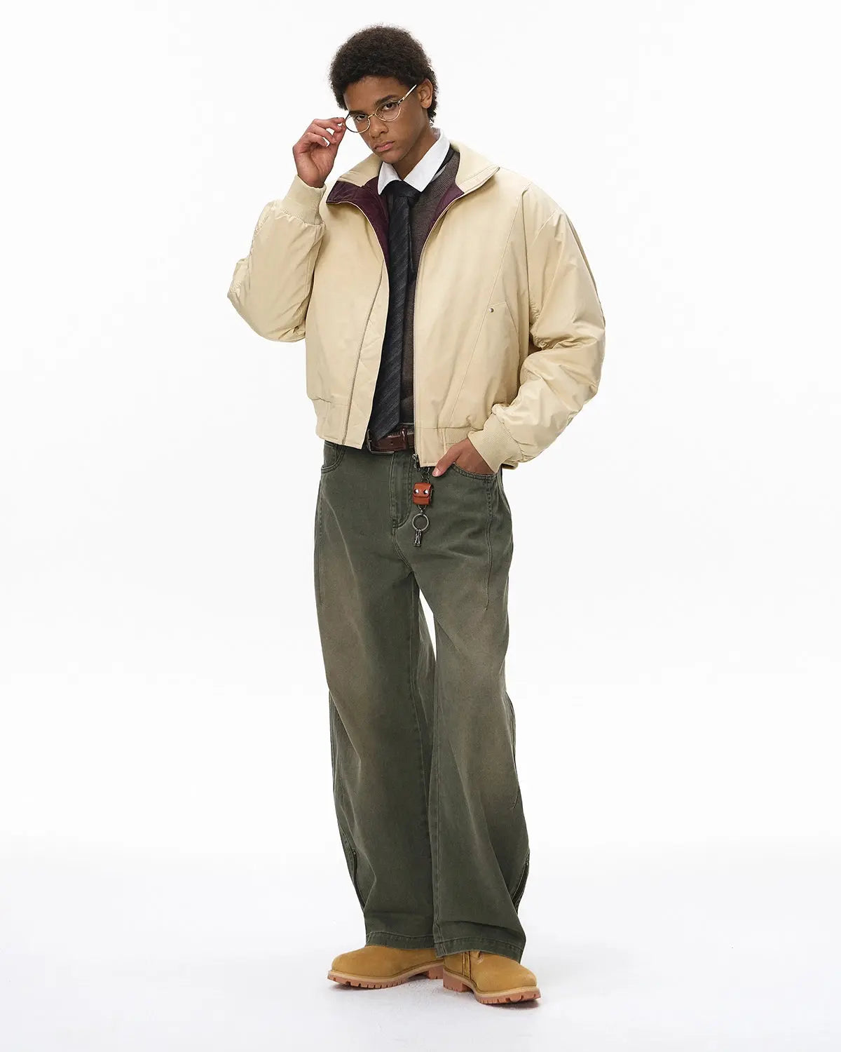 Cotton padded bomber jacket by INFLATION, streetwear style with a sleek fit and padded design, shown on a model.