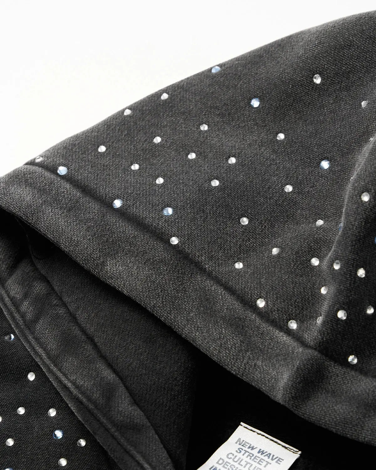 Distressed washed rhinestone zip-up hoodie by INFLATION Streetwear featuring a casual fit, rhinestone accents, and a front zipper closure.