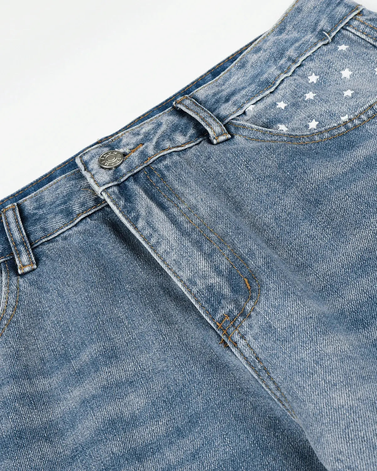 Dark blue Star Pocket Bootcut Jeans by INFLATION with star embroidery on back pockets, relaxed fit, and classic denim style.