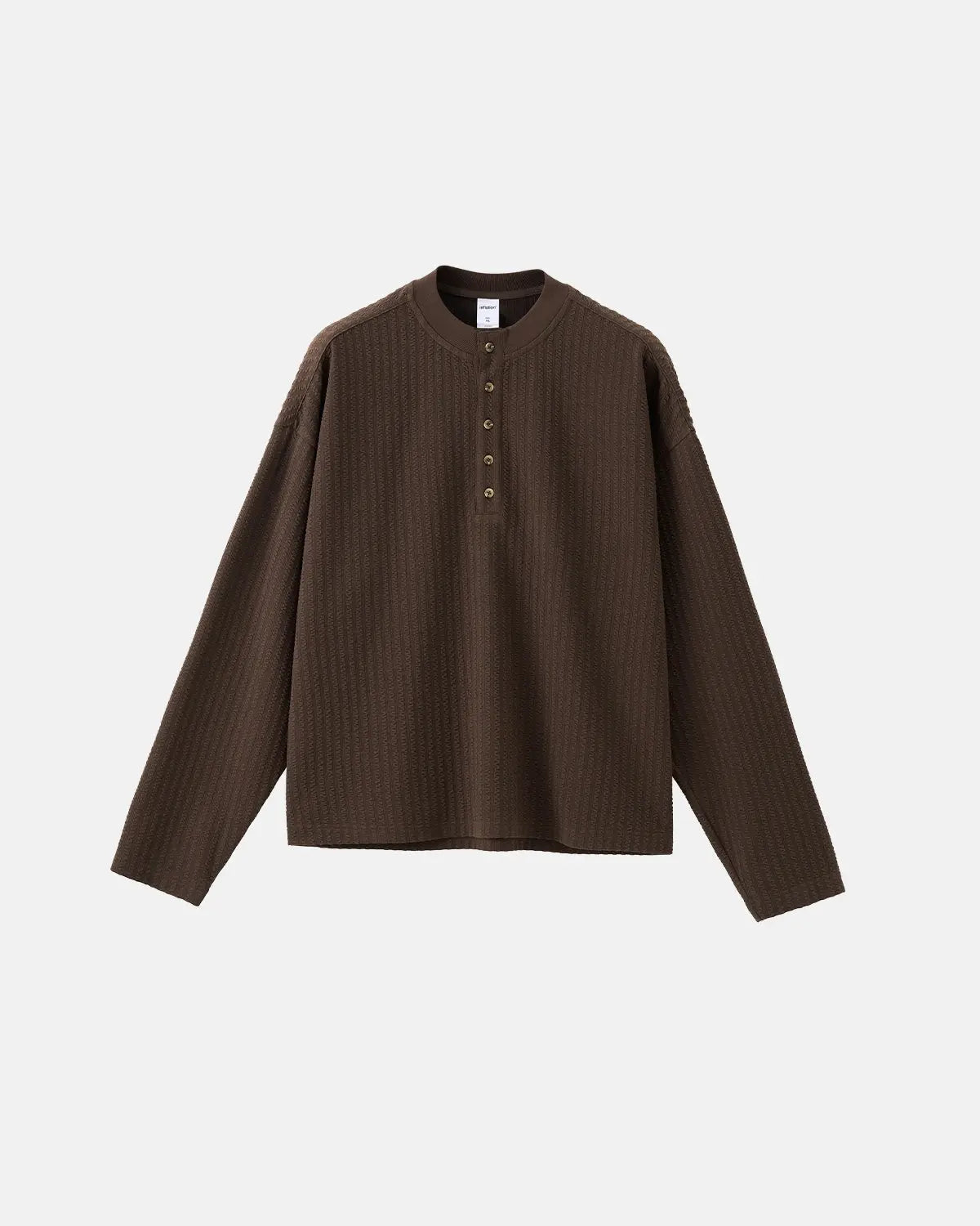 Inflation Old Money Style Henley long sleeve T-shirt in classic neutral color, casual streetwear look with buttoned neckline.