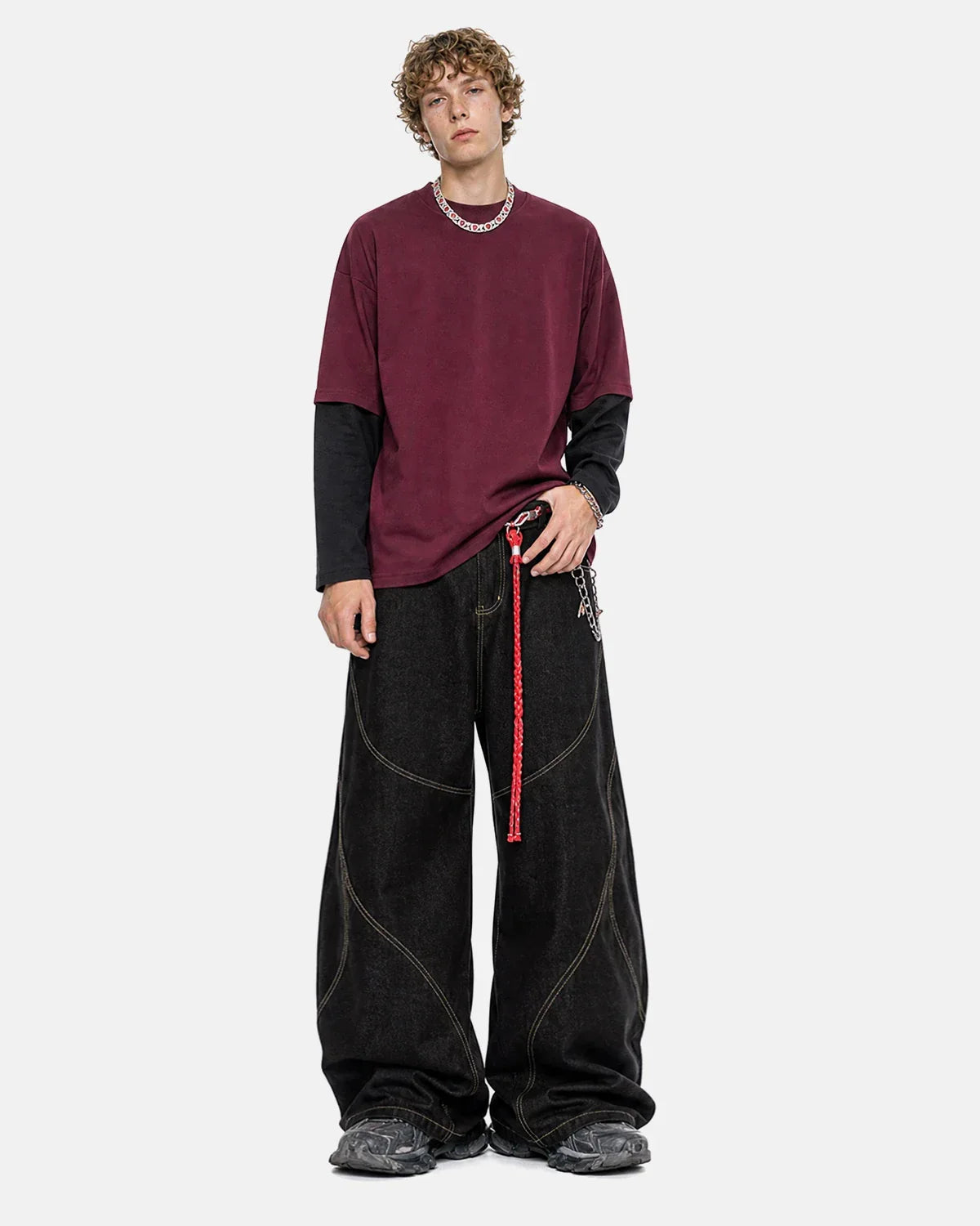 Color block long sleeve tee by INFLATION Streetwear featuring bold color blocks and a relaxed fit on a model.