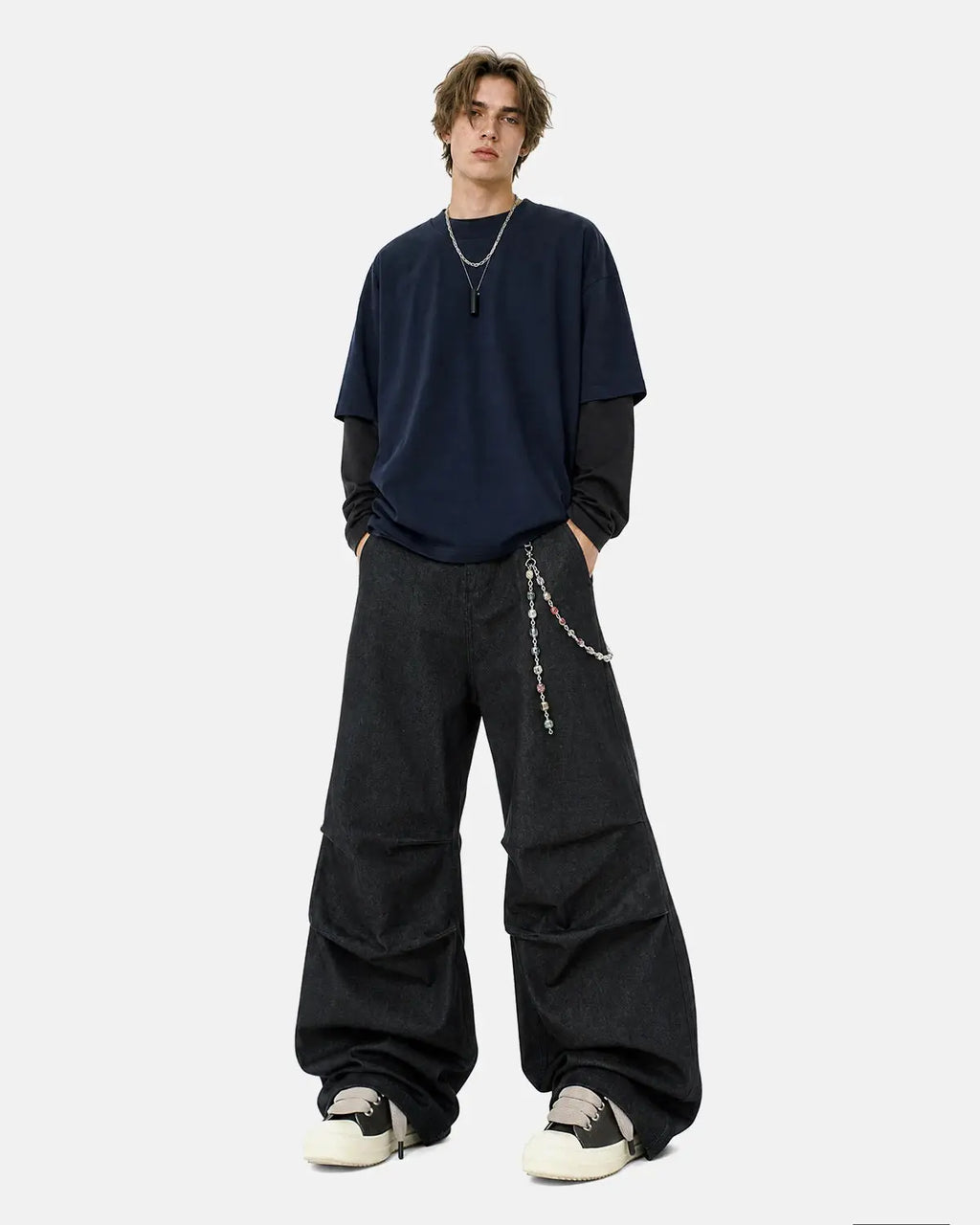 Inflation Super Raw Baggy Jeans featuring a relaxed fit, distressed details, and classic blue denim for streetwear style.