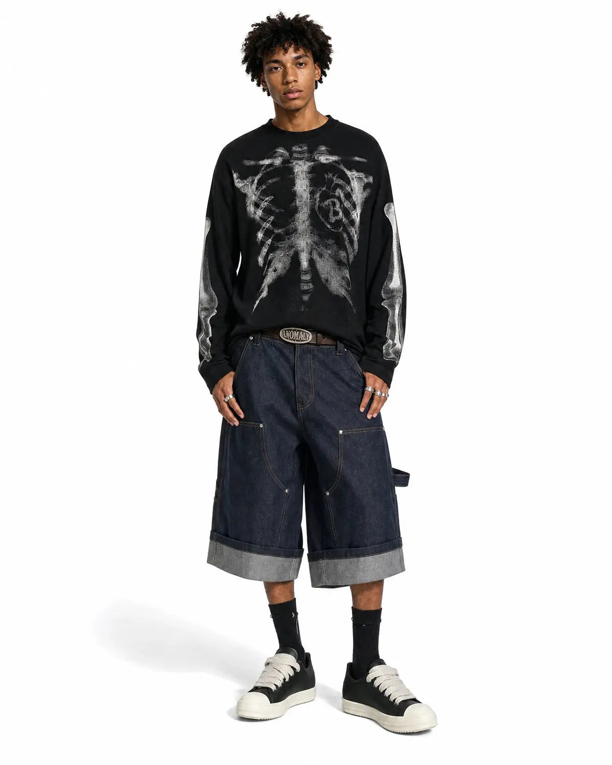 Inflation Skeleton Graphic Washed Long Sleeve shirt showcasing a skeleton print on a casual, distressed fabric in a streetwear style.