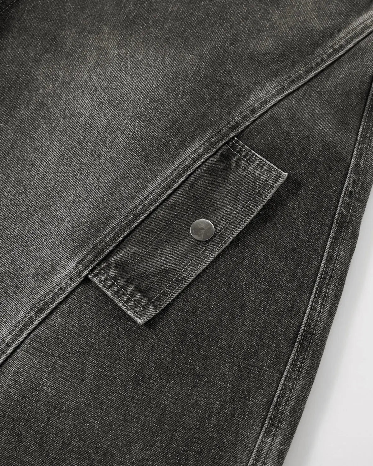 Distressed washed cargo barrel jeans by INFLATION featuring a relaxed fit, multiple pockets, and a trendy streetwear style.