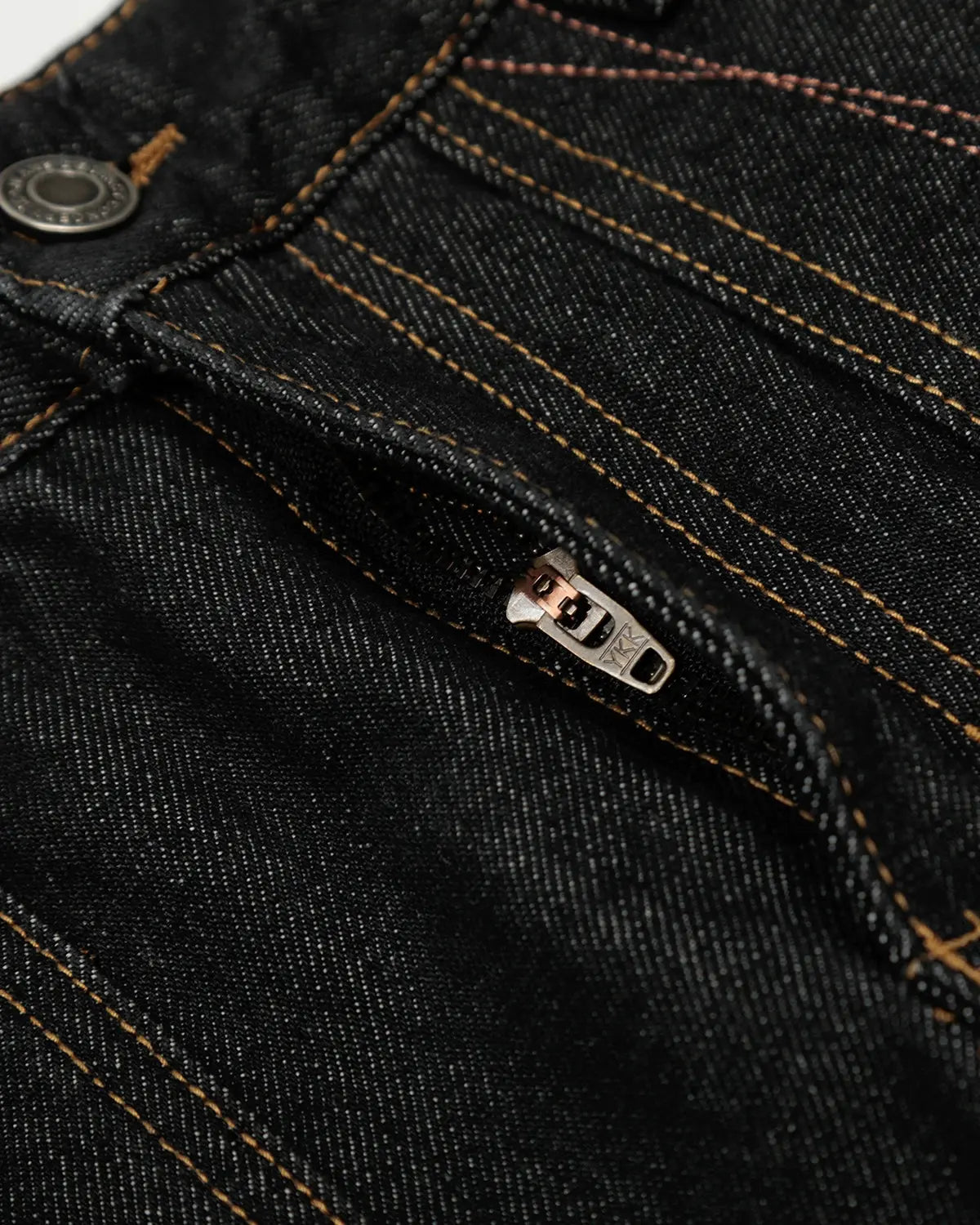 Raw embroidery Baggy Jeans by INFLATION featuring distressed denim, loose fit, and raw hem details in a streetwear style.
