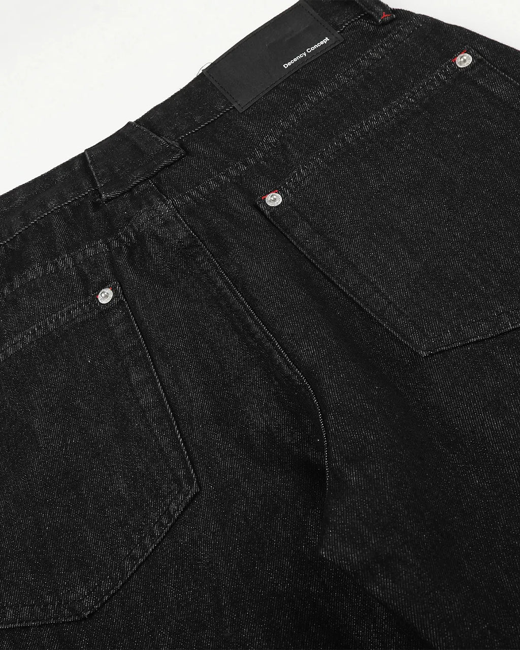 Inflation Streetwear barrel jeans with side eyelet buttons, showcasing the denim fabric and stylish button details.