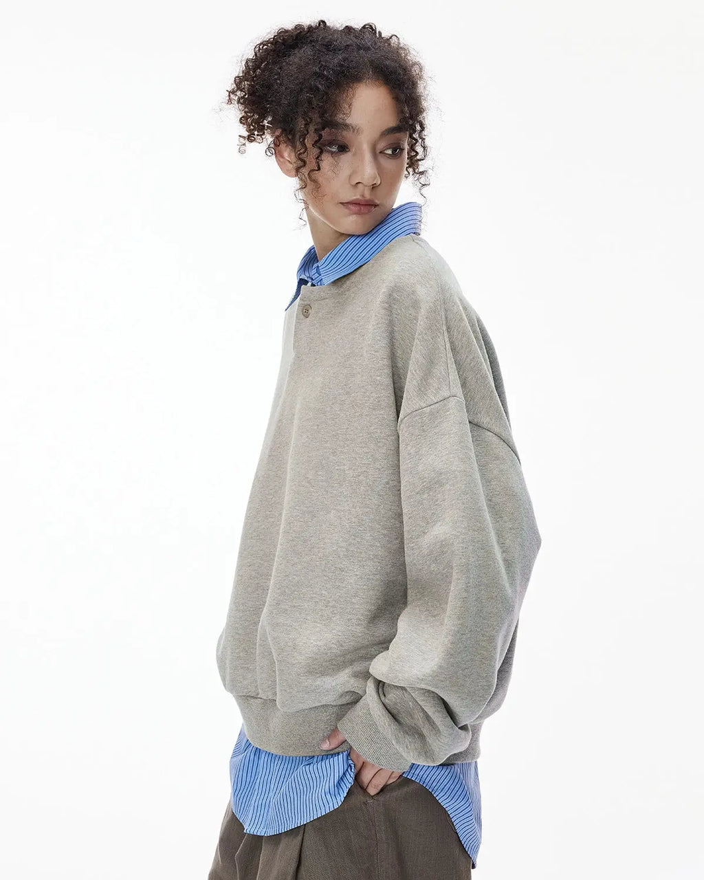 Boxy fit Henley collar sweatshirt by INFLATION Streetwear, featuring a relaxed fit and casual style in the image.