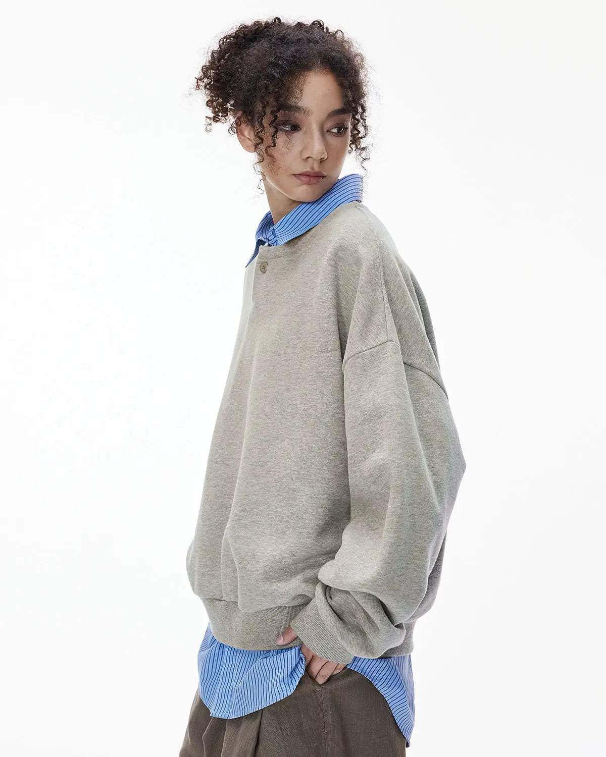 Boxy fit Henley collar sweatshirt by INFLATION Streetwear, featuring a relaxed fit and casual style in the image.